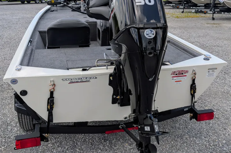 Slide: The Image of 2026 Tracker Pro 170 boat with outboard motor, rear view on trailer. - 3