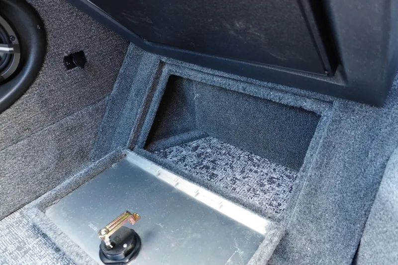 Slide: The Image of Interior storage compartment of 2026 Tracker Targa V-18 WT boat. - 13