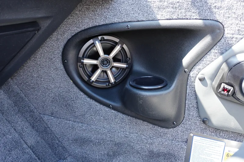 Slide: The Image of 2026 Tracker Targa V-18 WT interior speaker and control panel detail. - 15