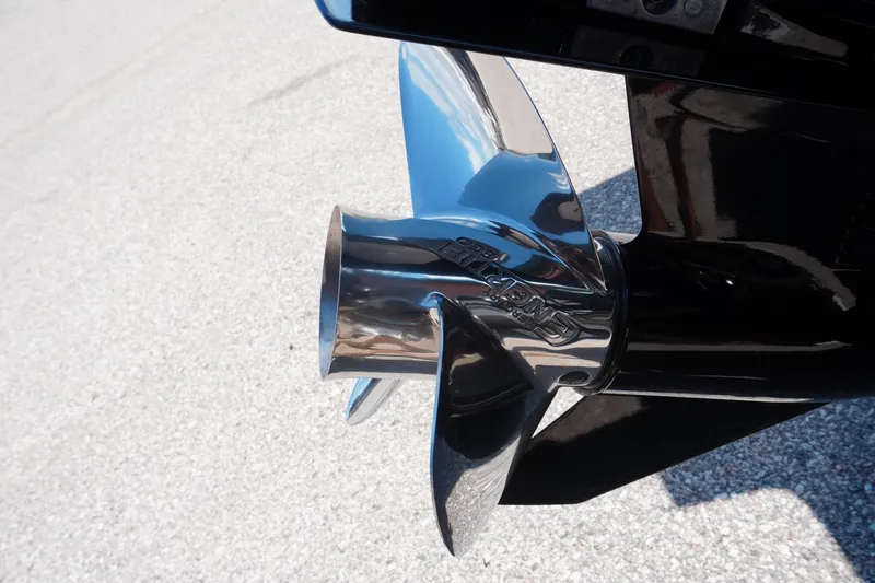 Slide: The Image of Shiny propeller of 2026 Tracker Targa V-18 WT boat on pavement background. - 3