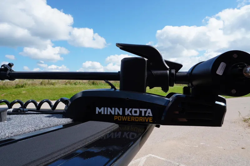 Slide: The Image of Minn Kota PowerDrive motor on 2026 Tracker Targa V-18 WT boat under blue sky. - 4