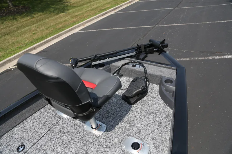 Slide: The Image of 2026 Tracker Pro Team 175 Crappie Edition boat with fishing seat and trolling motor. - 2
