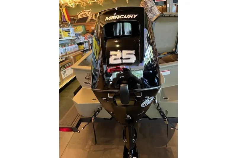 Slide: The Image of 2026 Tracker Grizzly 1650 T Prairie Wings Edition with Mercury 25 HP outboard motor. - 2