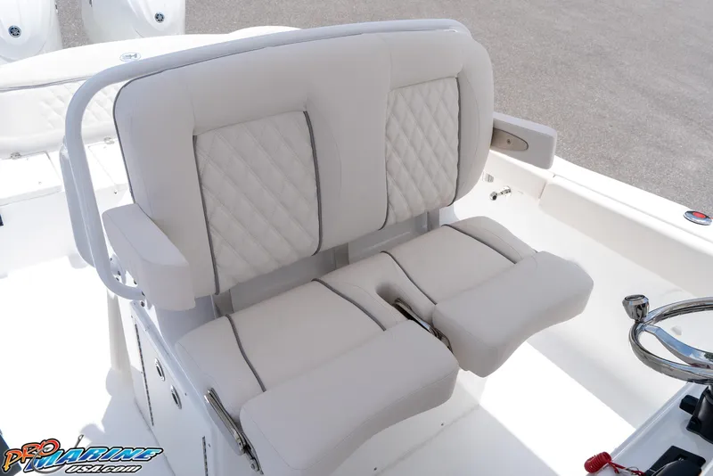 Slide: The Image of Luxury seating on 2026 Sea Hunt Ultra 265 SE boat, featuring plush, diamond-stitched upholstery. - 25