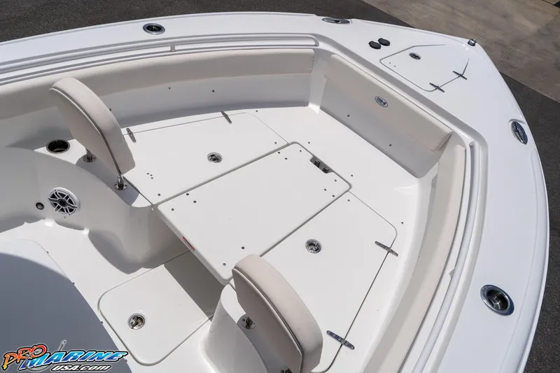 Slide: The Image of 2026 Sea Hunt Ultra 265 SE boat interior with seating and storage compartments. - 30