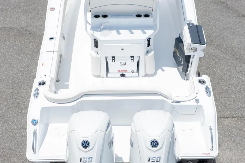 Slide: The Image of 2026 Sea Hunt Ultra 265 SE boat with dual Yamaha engines, top view. - 6