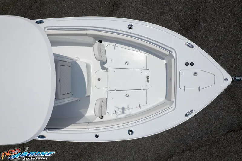 Slide: The Image of Top view of 2026 Sea Hunt Ultra 265 SE boat deck, showcasing seating and storage. - 7