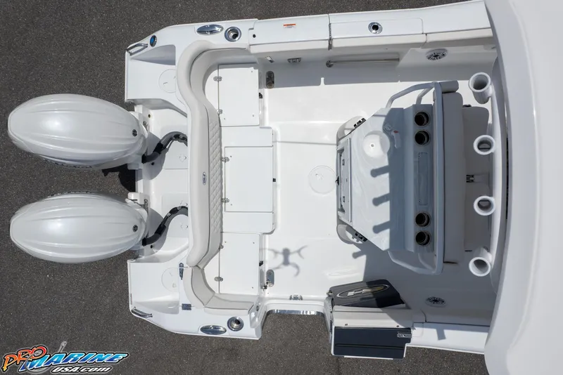 Slide: The Image of Overhead view of 2026 Sea Hunt Ultra 265 SE boat deck with dual engines. - 8