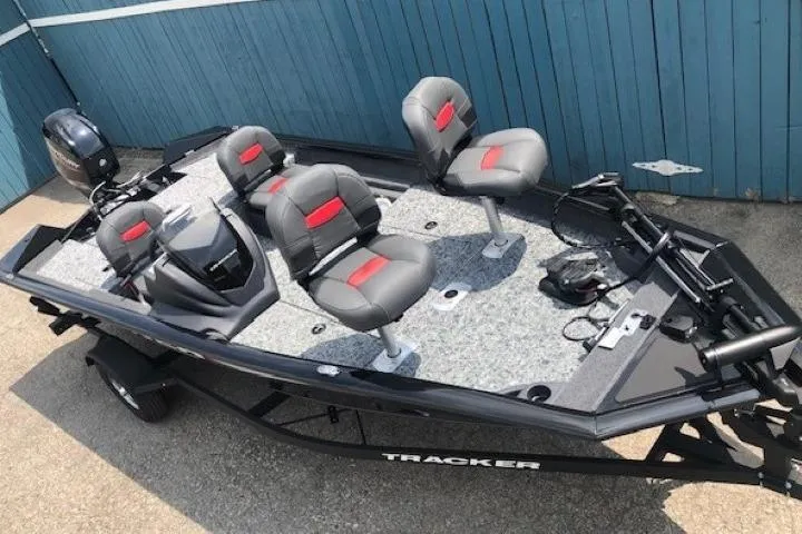 The Image of 2026 Tracker Pro Team 175 Crappie Edition fishing boat with four seats and motor. - 0