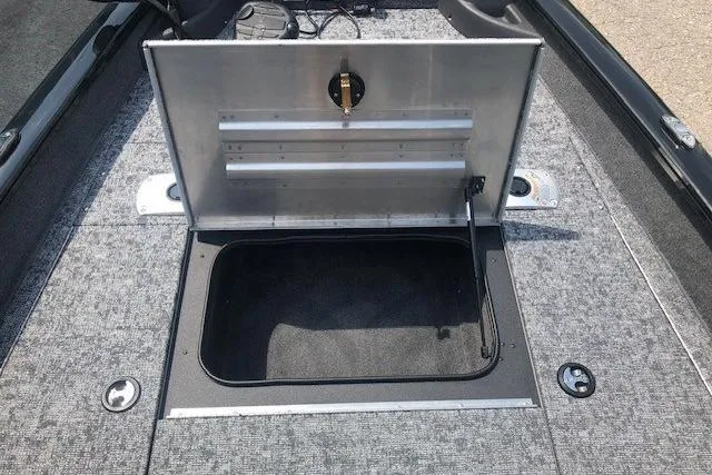 Slide: The Image of Open storage compartment on 2026 Tracker Pro Team 175 Crappie Edition boat. - 12