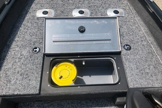 Slide: The Image of 2026 Tracker Pro Team 175 Crappie Edition boat with storage compartment and livewell. - 13