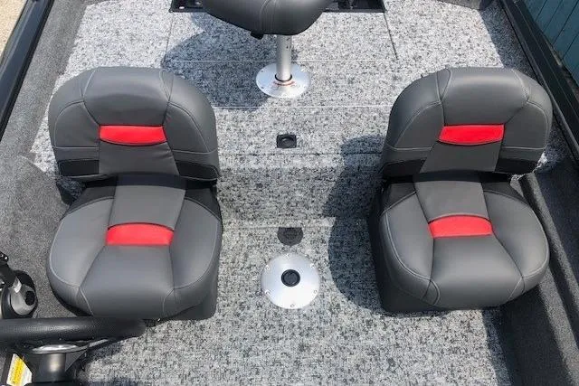 Slide: The Image of 2026 Tracker Pro Team 175 Crappie Edition boat seats with gray and red upholstery. - 16