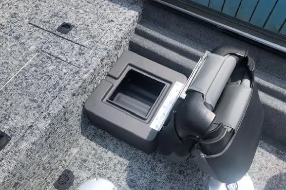 Slide: The Image of 2026 Tracker Pro Team 175 Crappie Edition boat interior with seating and storage compartment. - 21