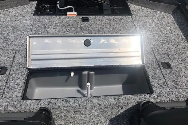 Slide: The Image of 2026 Tracker Pro Team 175 Crappie Edition boat interior with open storage compartment. - 24