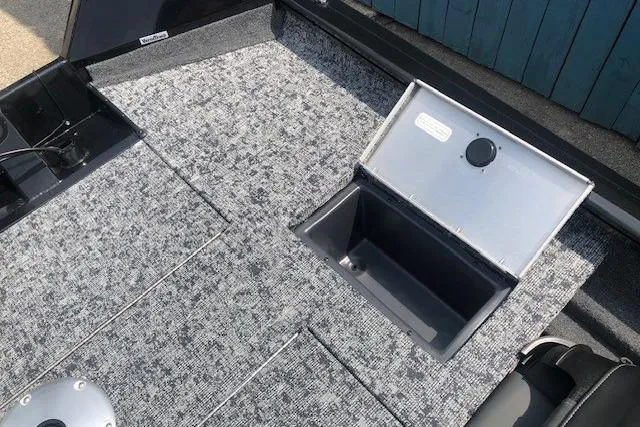 Slide: The Image of 2026 Tracker Pro Team 175 Crappie Edition boat interior with storage compartment. - 25