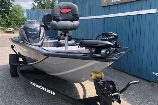 Slide: The Image of 2026 Tracker Pro Team 175 Crappie Edition boat on trailer, parked outdoors. - 3