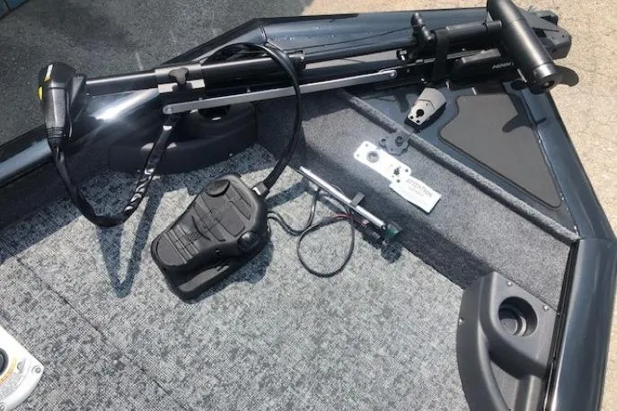 Slide: The Image of 2026 Tracker Pro Team 175 Crappie Edition boat deck with trolling motor and foot pedal. - 9