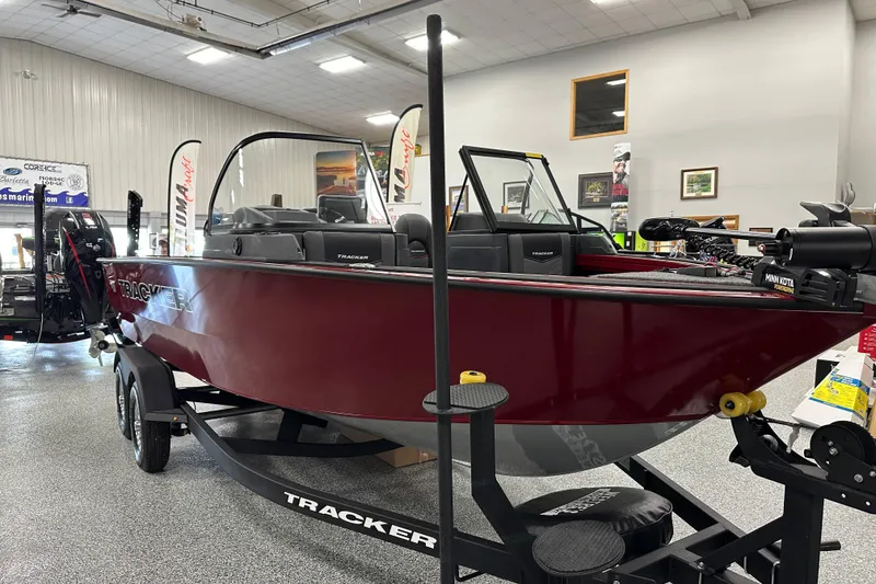 Slide: The Image of 2026 Tracker Targa V-18 WT boat interior with Minn Kota trolling motor. - 6