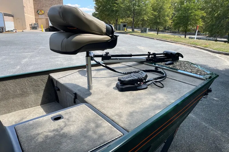 Slide: The Image of 2026 Tracker Bass Tracker Classic Limited boat with seating and trolling motor. - 6
