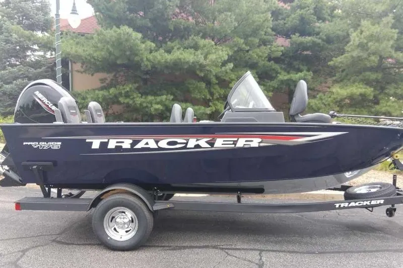 The Image of 2026 Tracker Pro Guide V-175 WT boat on trailer, parked outdoors. - 0