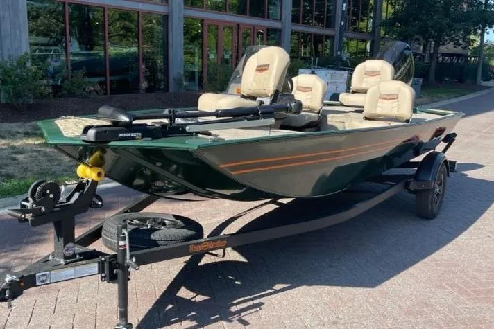 Slide: The Image of 2026 Tracker Bass Tracker Classic Limited boat on trailer, parked outdoors. - 3