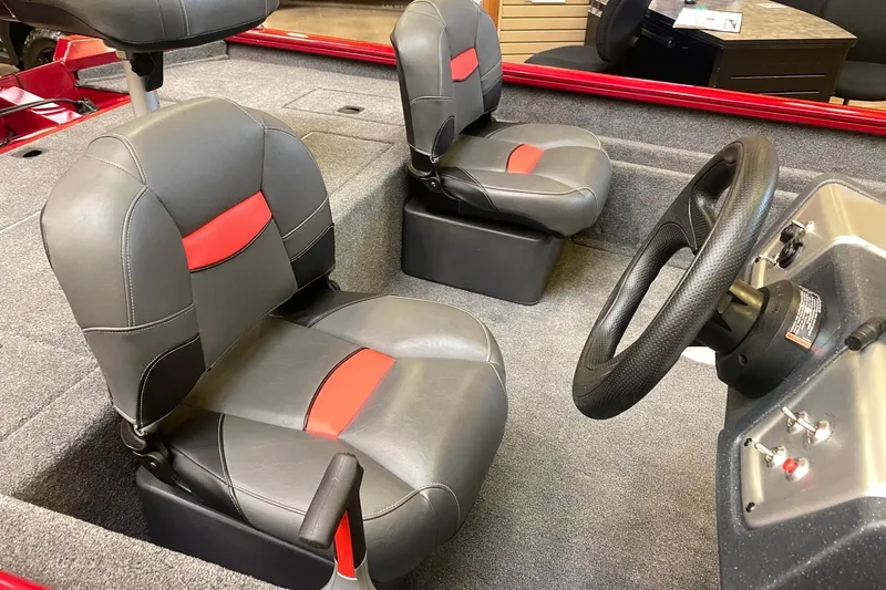 Slide: The Image of 2026 Tracker Pro Team 175 Crappie Edition boat interior with gray and red seating. - 11