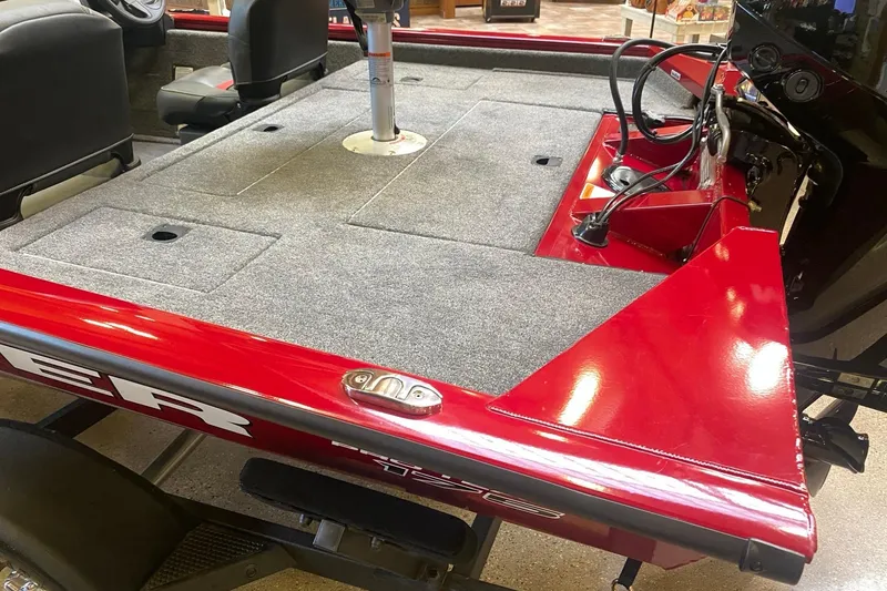 Slide: The Image of 2026 Tracker Pro Team 175 Crappie Edition boat with red and gray deck. - 14
