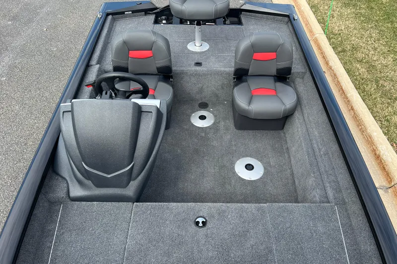 Slide: The Image of 2026 Tracker Pro Team 175 Crappie Edition boat interior with gray and red seating. - 5