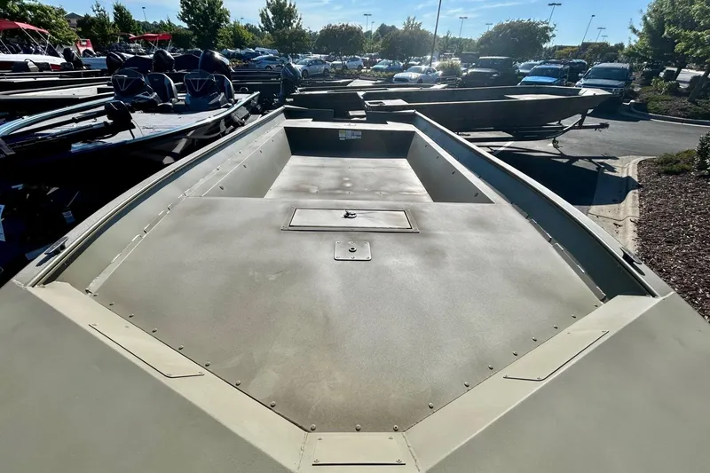 Slide: The Image of 2026 Tracker Grizzly 2072 Utility boat on trailer in parking lot. - 3