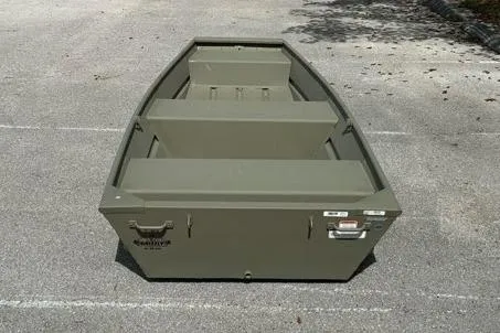 Slide: The Image of 2026 Tracker Grizzly 12 Jon boat on pavement, showcasing its sturdy design. - 3