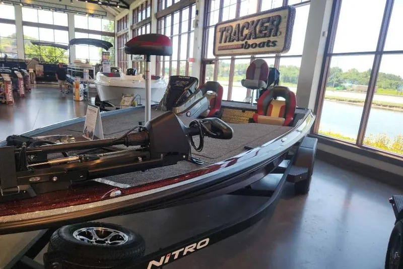 Slide: The Image of 2026 Nitro Z20 XL Pro boat displayed in showroom with Tracker Boats signage. - 1