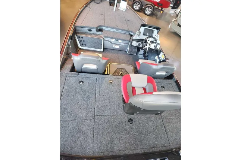 Slide: The Image of 2026 Nitro Z20 XL Pro boat interior with seating and control console. - 4