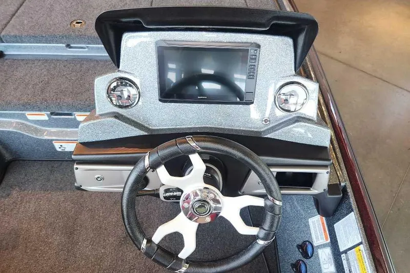 Slide: The Image of 2026 Nitro Z20 XL Pro boat dashboard with steering wheel and digital display. - 5