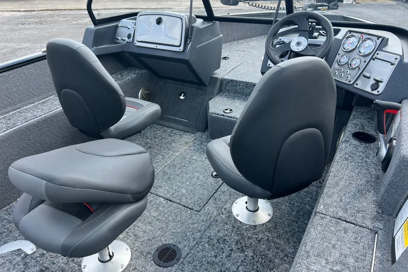 Slide: The Image of 2026 Tracker Pro Guide V-175 WT boat interior with dual seats and control panel. - 9