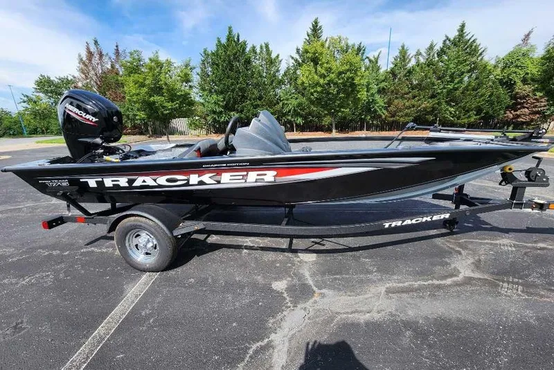 Slide: The Image of 2026 Tracker Pro Team 175 Crappie Edition boat on trailer, parked outdoors. - 5