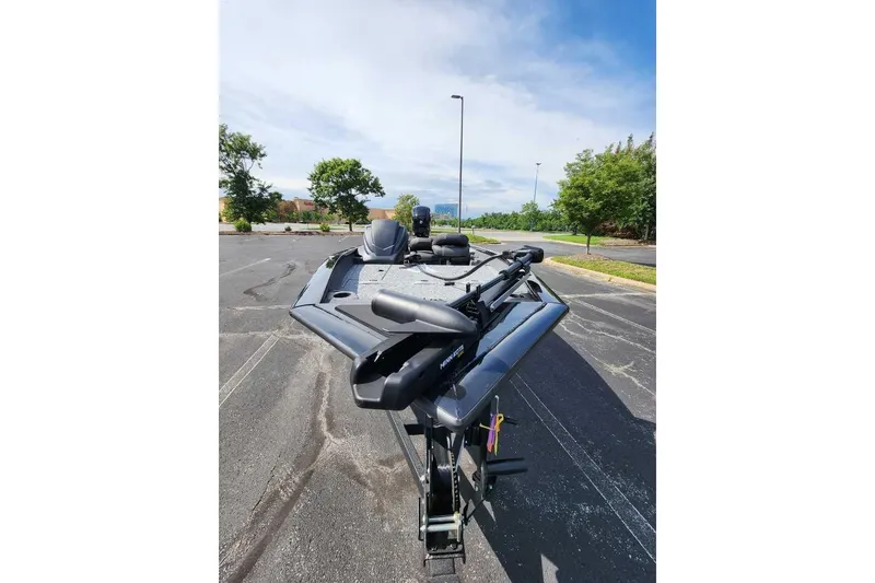 Slide: The Image of 2026 Tracker Pro Team 175 Crappie Edition boat in parking lot, sunny day. - 7