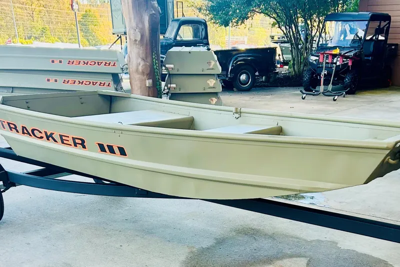 The Image of 2026 Tracker Grizzly 10 Jon boat on trailer, parked outdoors. - 0