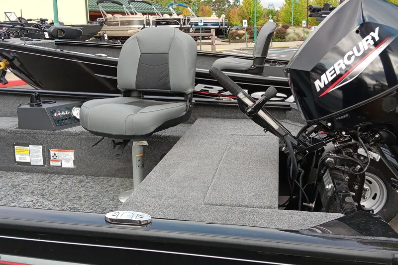 Slide: The Image of 2025 Tracker Super Guide V-16 T boat interior with Mercury engine and seating. - 3