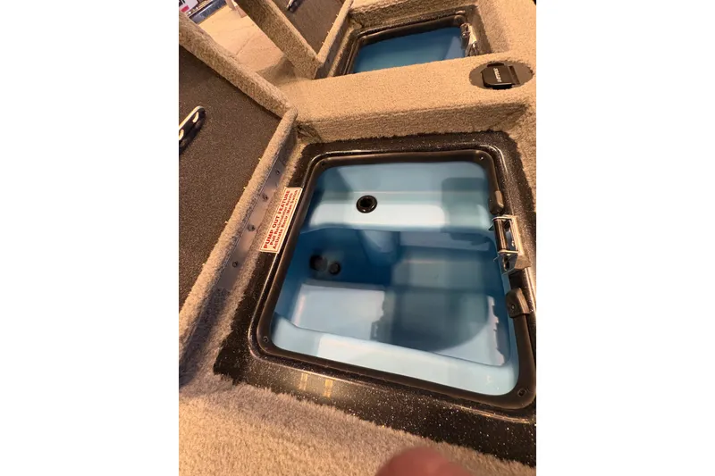 Slide: The Image of Open storage compartment in 2026 Nitro Z20 XL Pro boat. - 9