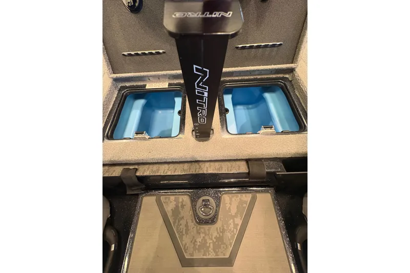Slide: The Image of 2026 Nitro Z20 XL Pro boat interior with storage compartments and branded handle. - 10