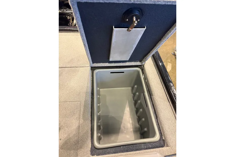 Slide: The Image of Storage compartment in 2026 Nitro Z20 XL Pro boat, featuring a secure latch system. - 11