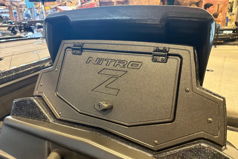 Slide: The Image of 2026 Nitro Z20 XL Pro boat compartment with secure latch and sleek design. - 17