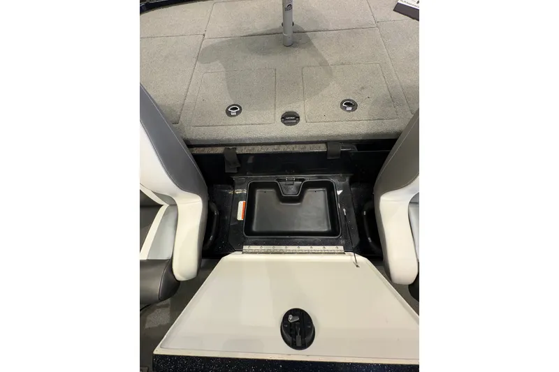 Slide: The Image of Interior view of 2026 Nitro Z20 XL Pro boat, featuring seating and storage compartments. - 7