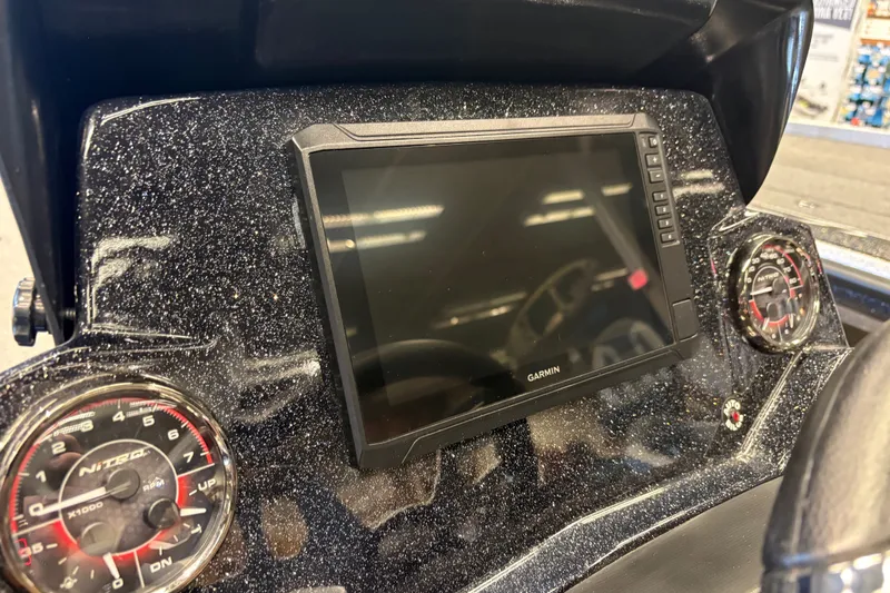 Slide: The Image of Dashboard of 2026 Nitro Z20 XL Pro with Garmin display and gauges. - 16