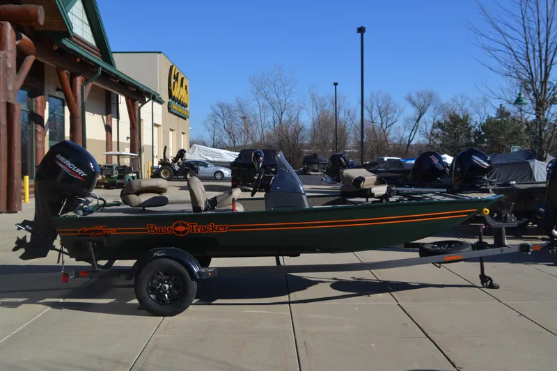 The Image of 2026 Tracker Bass Tracker Classic Limited boat displayed outside a store. - 0