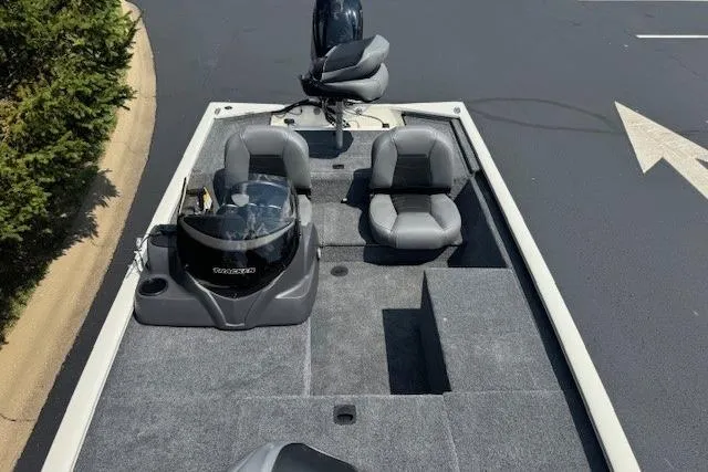 Slide: The Image of 2026 Tracker Pro 170 boat with gray seating and carpeted deck. - 4