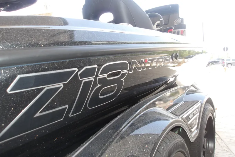 Slide: The Image of 2026 Nitro Z18 Pro boat, sleek black design with prominent branding. - 11