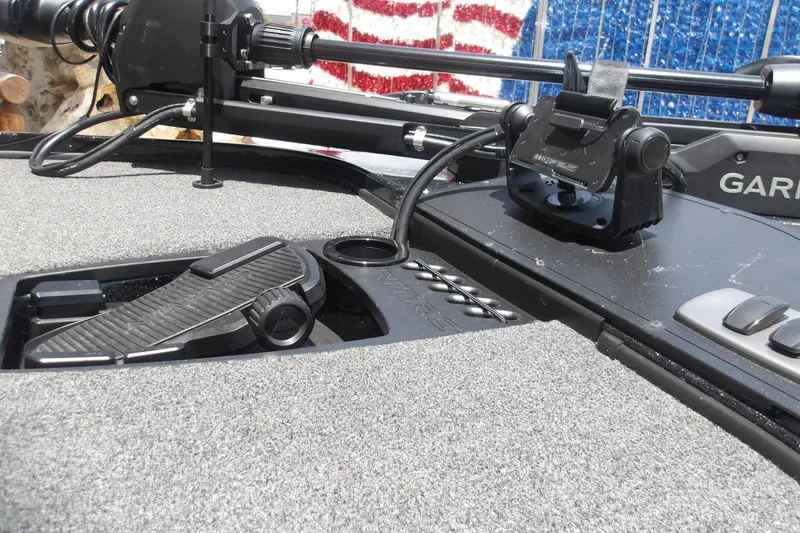 Slide: The Image of Nitro Z18 Pro 2026 boat deck with advanced control panel and foot pedal. - 18