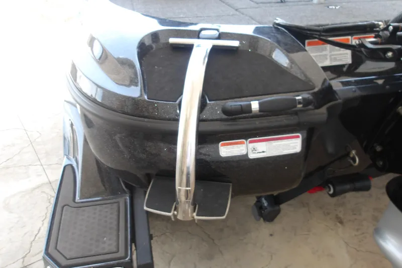 Slide: The Image of 2026 Nitro Z18 Pro boat rear view with step ladder and safety labels. - 10