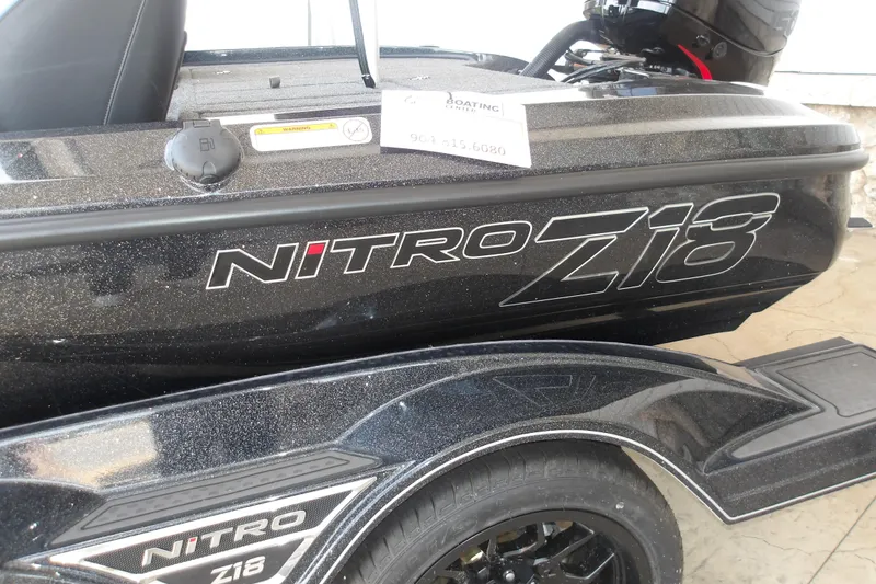 Slide: The Image of 2026 Nitro Z18 Pro boat with sleek black design and branding. - 7
